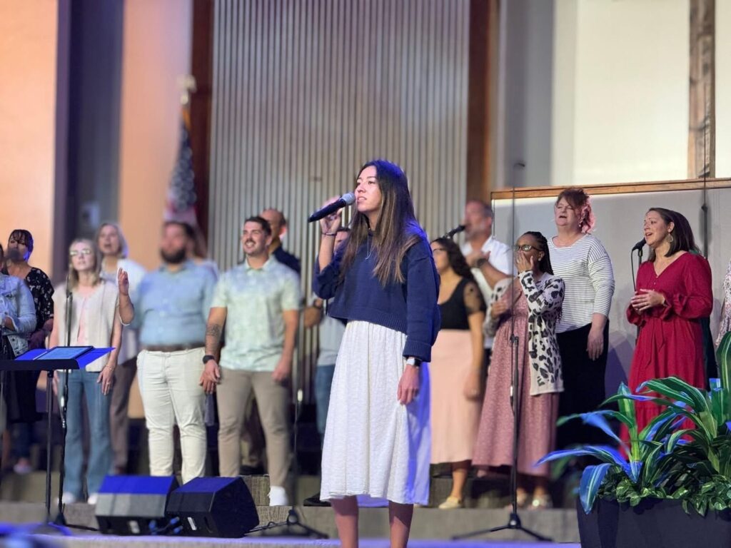 Alexis Singing at Church