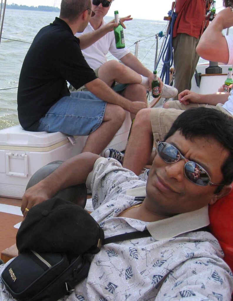 Achyut on a boat during company summer event Achyut on a boat during company summer event